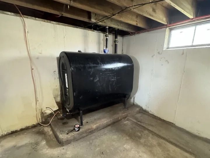 Basement oil tank in the Lebanon, CT Cape — a common inspection item on older Connecticut homes
