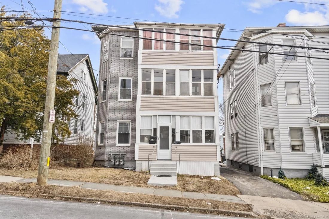 Three-unit multi-family on Curtis Street in New Britain, CT after cleanout and repairs